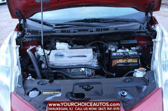 Photo of 2011 Cayenne Red Nissan Leaf