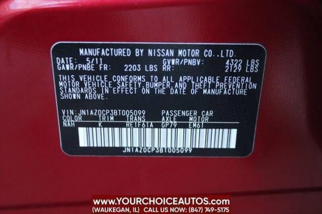 Photo of 2011 Cayenne Red Nissan Leaf