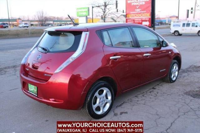 Photo of 2011 Cayenne Red Nissan Leaf