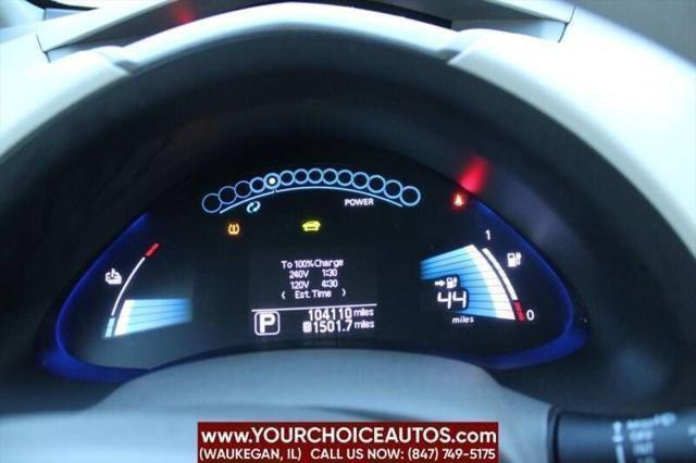 Photo of 2011 Cayenne Red Nissan Leaf