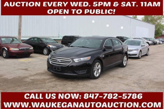 Photo of 2013 Tuxedo Black Metallic Ford Taurus