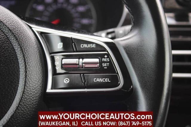 Photo of 2021 Cherry Black Kia Seltos
