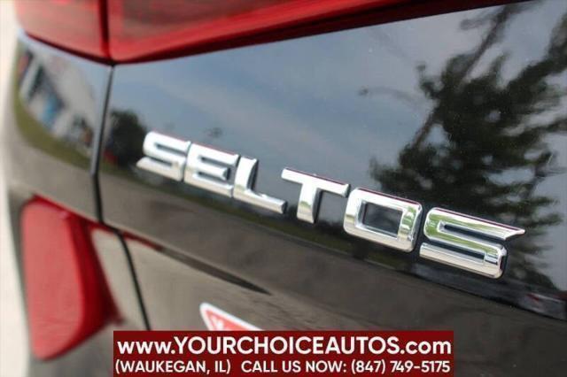 Photo of 2021 Cherry Black Kia Seltos