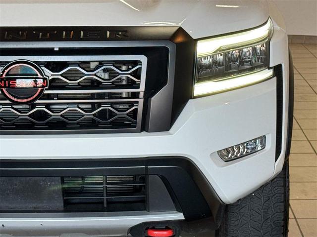 Photo of 2023 Glacier White Nissan Frontier