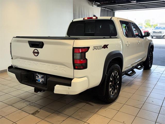 Photo of 2023 Glacier White Nissan Frontier