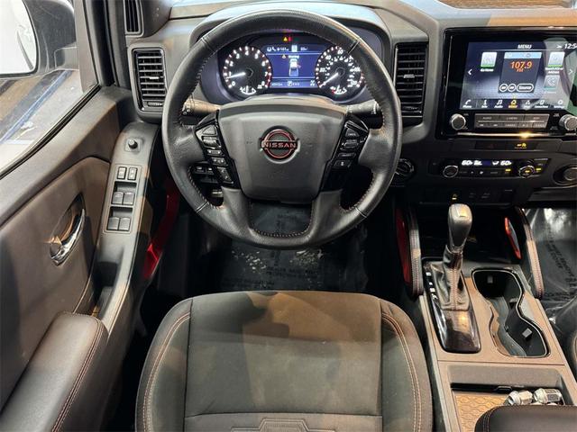 Photo of 2023 Glacier White Nissan Frontier