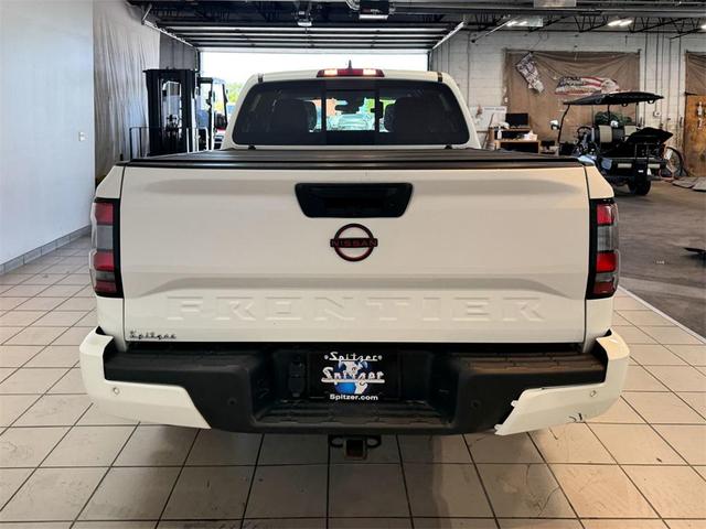 Photo of 2023 Glacier White Nissan Frontier