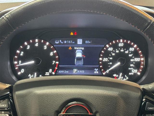 Photo of 2023 Glacier White Nissan Frontier