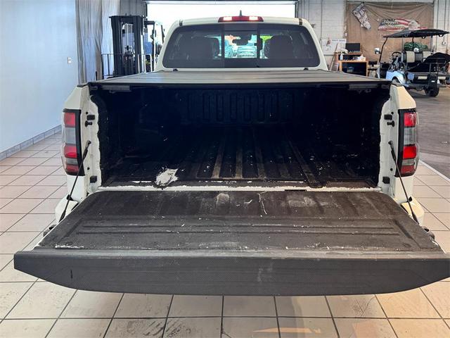 Photo of 2023 Glacier White Nissan Frontier