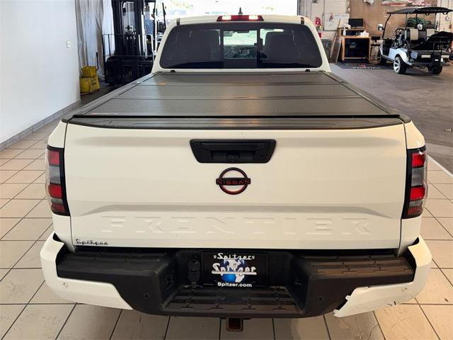 Photo of 2023 Glacier White Nissan Frontier