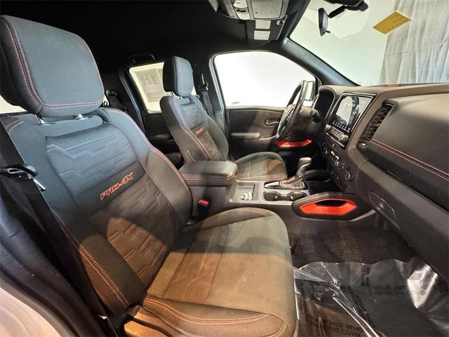 Photo of 2023 Glacier White Nissan Frontier