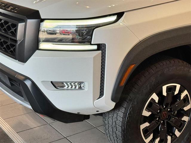 Photo of 2023 Glacier White Nissan Frontier