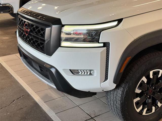 Photo of 2023 Glacier White Nissan Frontier