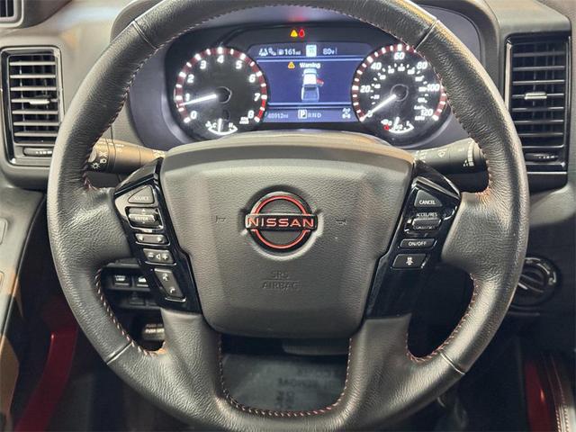 Photo of 2023 Glacier White Nissan Frontier