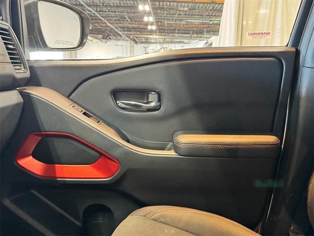 Photo of 2023 Glacier White Nissan Frontier