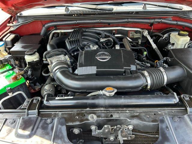 Photo of 2014 Cayenne Red Nissan Xterra