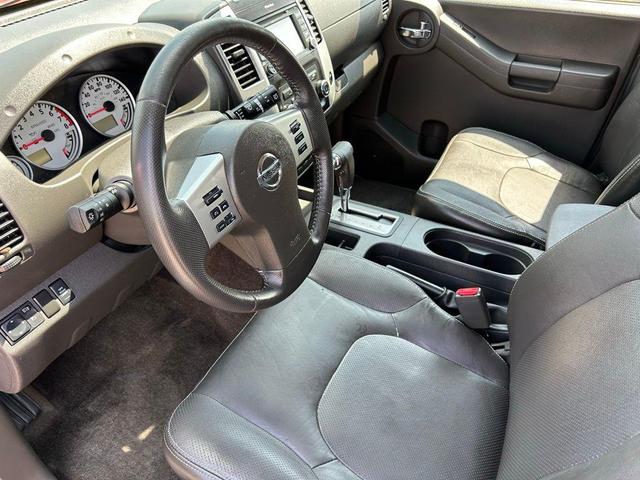 Photo of 2014 Cayenne Red Nissan Xterra
