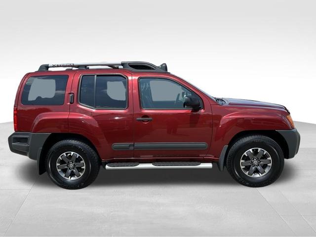 Photo of 2014 Cayenne Red Nissan Xterra