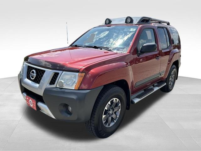 Photo of 2014 Cayenne Red Nissan Xterra