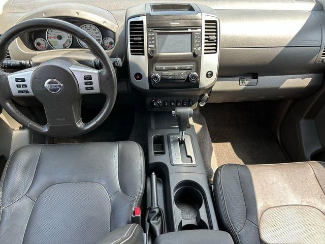 Photo of 2014 Cayenne Red Nissan Xterra