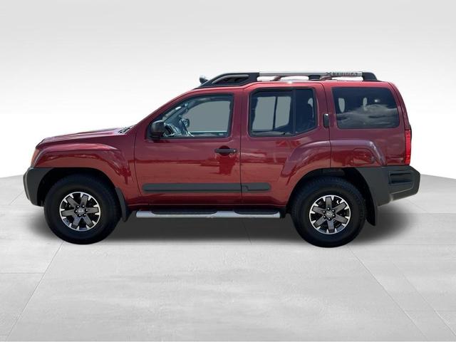Photo of 2014 Cayenne Red Nissan Xterra