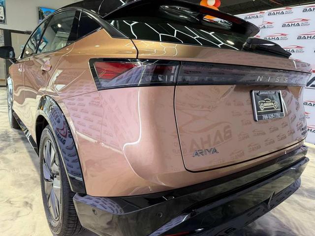 Photo of 2023 Sunrise Copper Pearl/Black Diamond Pearl Nissan ARIYA