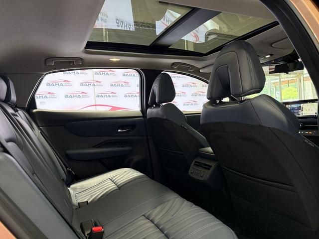 Photo of 2023 Sunrise Copper Pearl/Black Diamond Pearl Nissan ARIYA