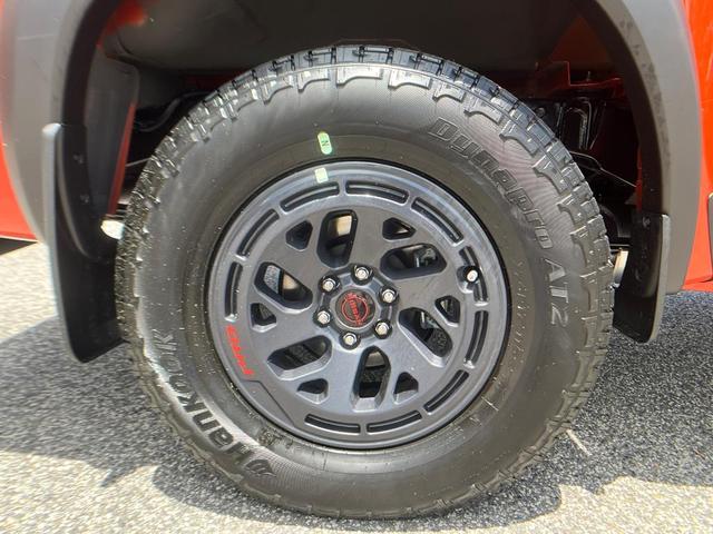 Photo of 2025 Afterburn Orang Nissan Frontier
