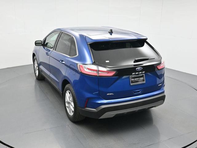 Photo of 2024 Atlas Blue Metallic Ford Edge