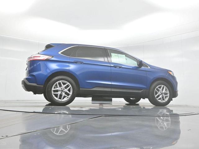 Photo of 2024 Atlas Blue Metallic Ford Edge