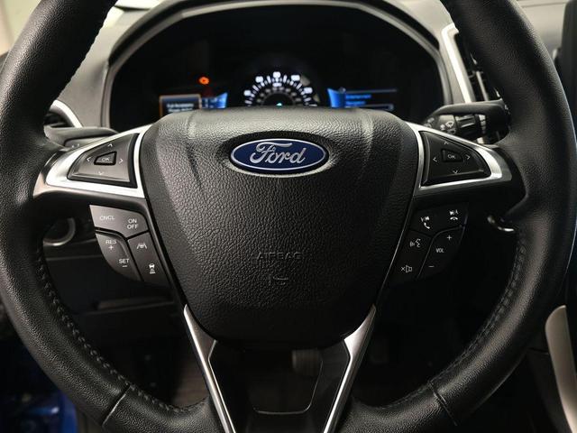 Photo of 2024 Atlas Blue Metallic Ford Edge