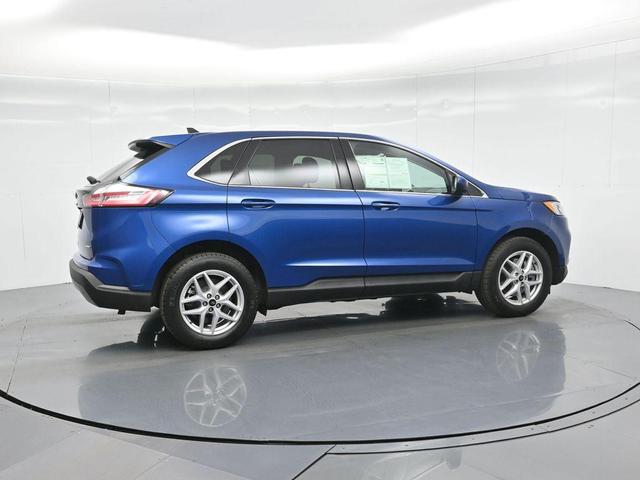 Photo of 2024 Atlas Blue Metallic Ford Edge