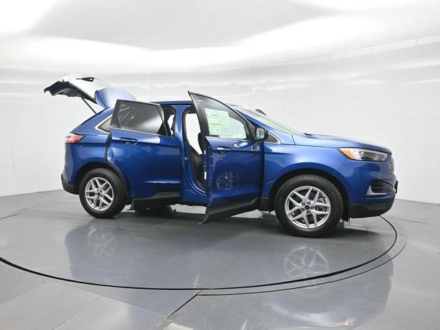 Photo of 2024 Atlas Blue Metallic Ford Edge
