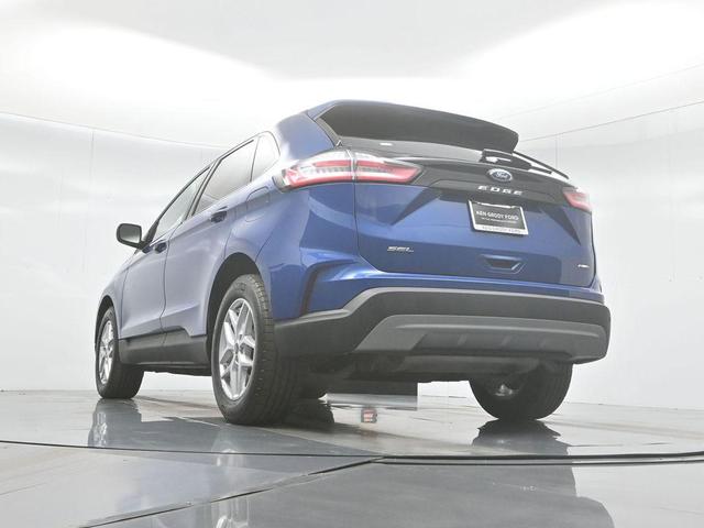 Photo of 2024 Atlas Blue Metallic Ford Edge