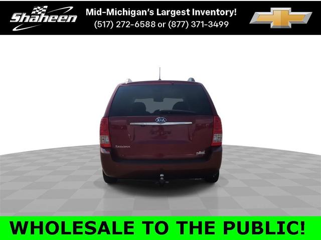 Photo of 2012 Claret Red Kia Sedona