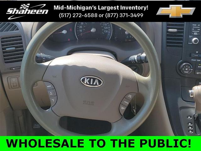 Photo of 2012 Claret Red Kia Sedona