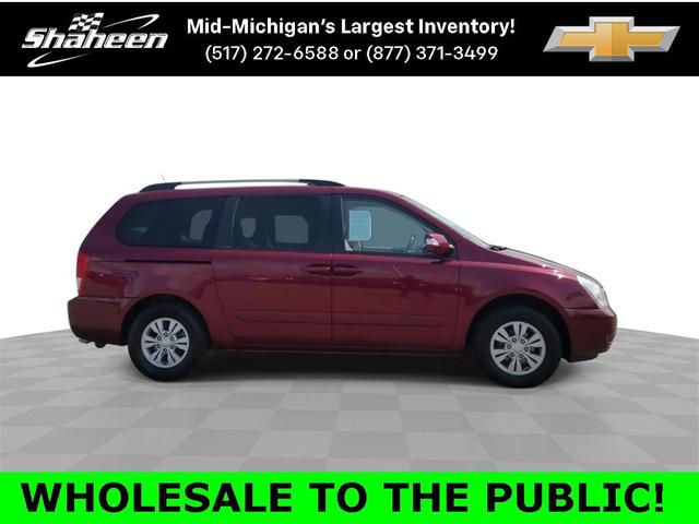 Photo of 2012 Claret Red Kia Sedona