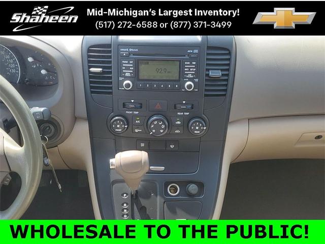 Photo of 2012 Claret Red Kia Sedona