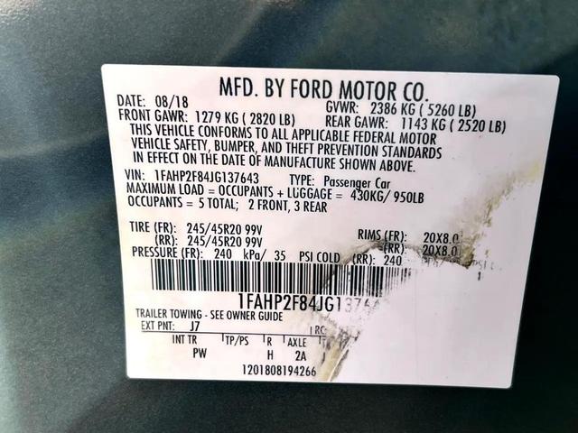 Photo of 2018 Magnetic Metallic Ford Taurus