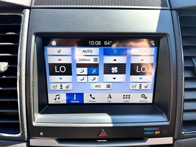 Photo of 2018 Magnetic Metallic Ford Taurus
