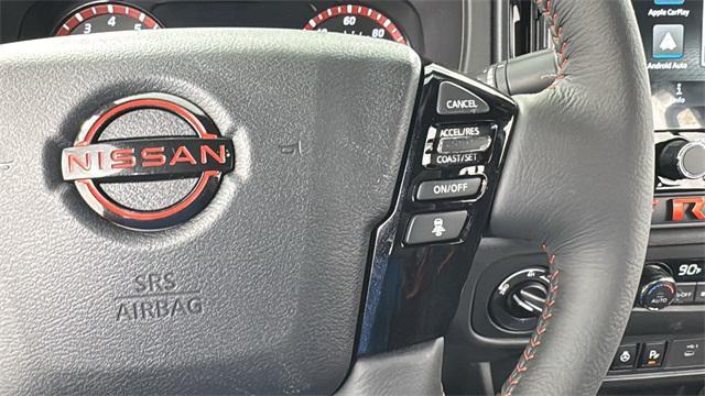 Photo of 2025 Glacier White Nissan Frontier
