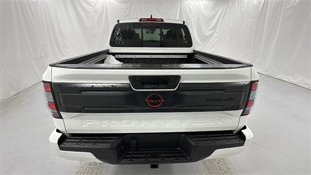 Photo of 2025 Glacier White Nissan Frontier