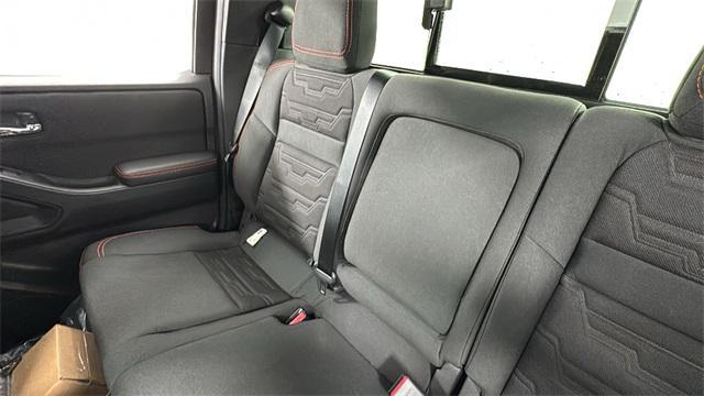 Photo of 2025 Glacier White Nissan Frontier