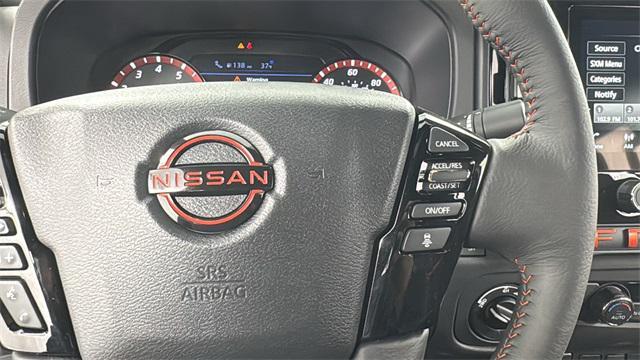 Photo of 2025 Boulder Gray Pearl Nissan Frontier