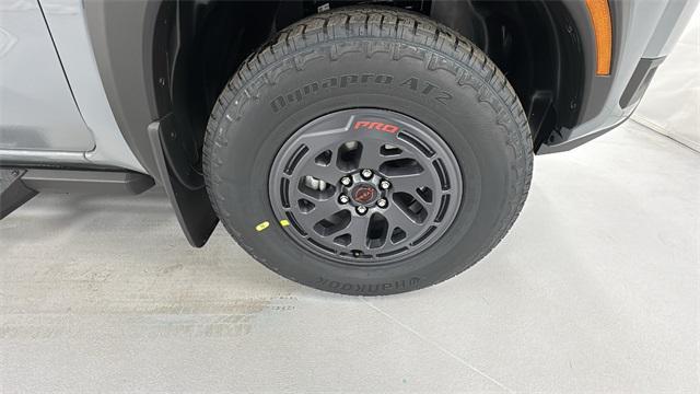 Photo of 2025 Boulder Gray Pearl Nissan Frontier