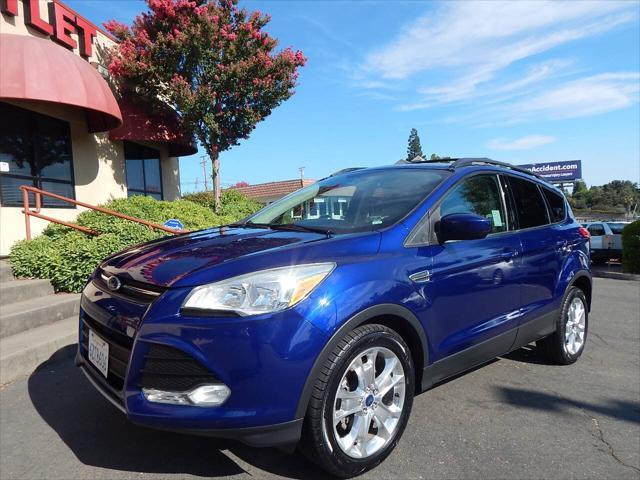 Photo of 2013 Deep Impact Blue Ford Escape