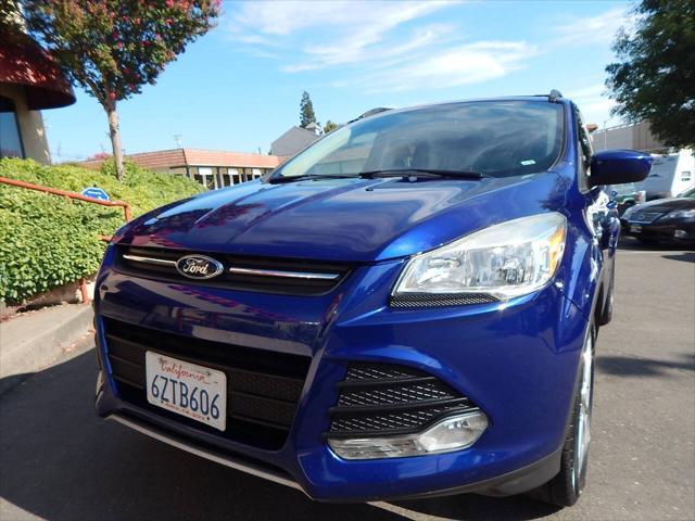 Photo of 2013 Deep Impact Blue Ford Escape