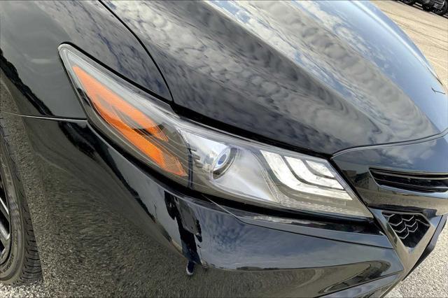 Photo of 2023 Midnight Black Metallic Toyota Camry