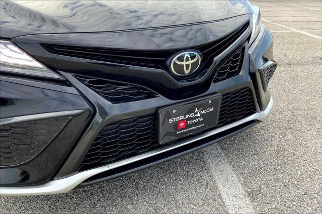 Photo of 2023 Midnight Black Metallic Toyota Camry