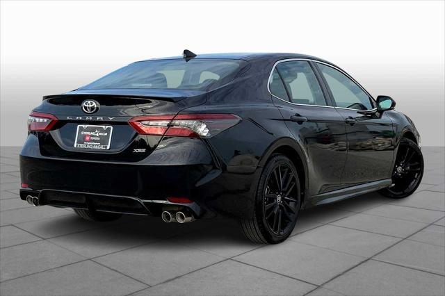 Photo of 2023 Midnight Black Metallic Toyota Camry
